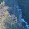 C ) Suspension Bridge Crosses Raven Cliff Falls
