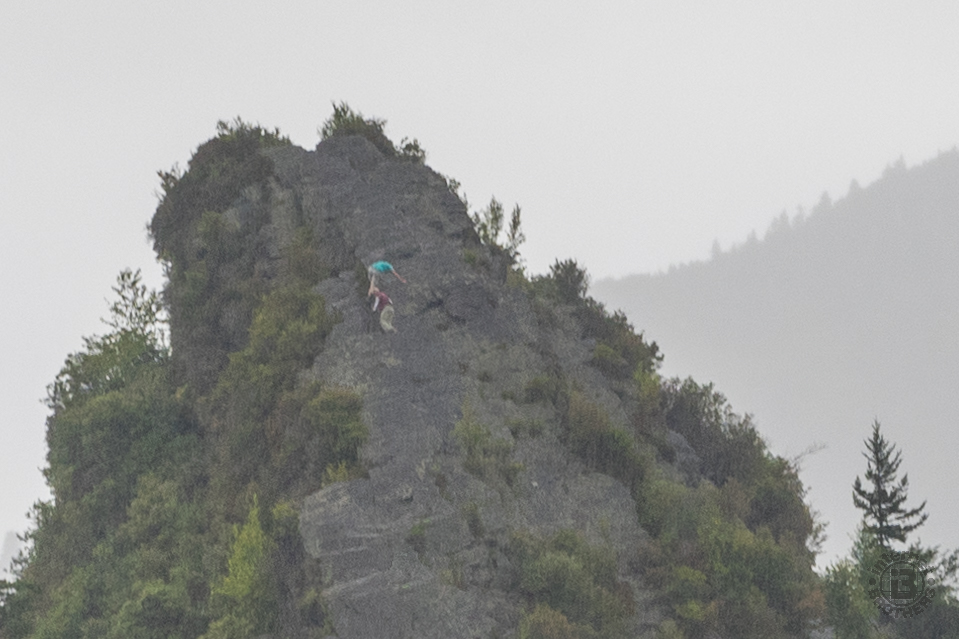 John and Ken climb the very treacherous south pinnacle of Chimney Tops.